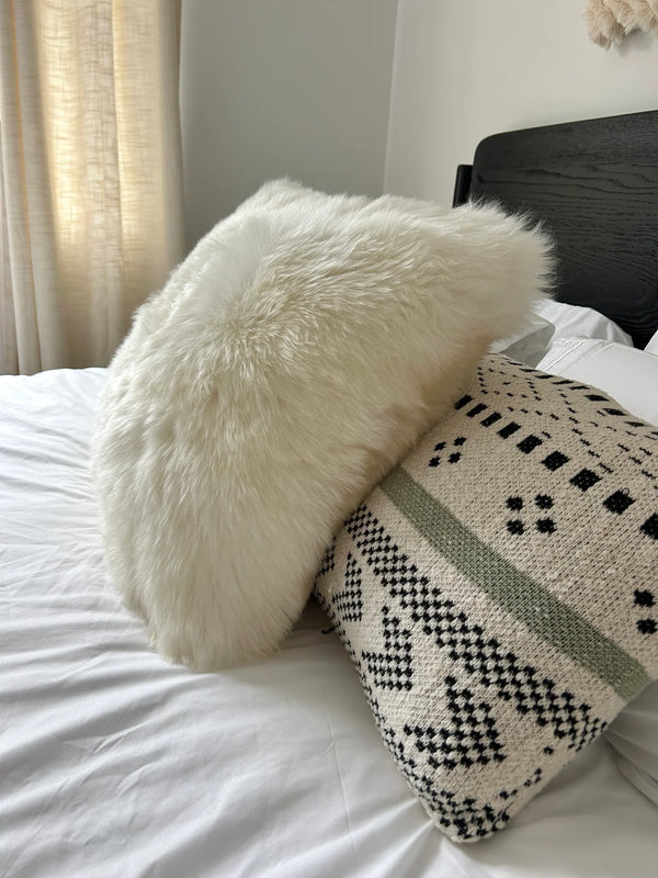 Side-view of double sided ivory sheepskin pillowcase