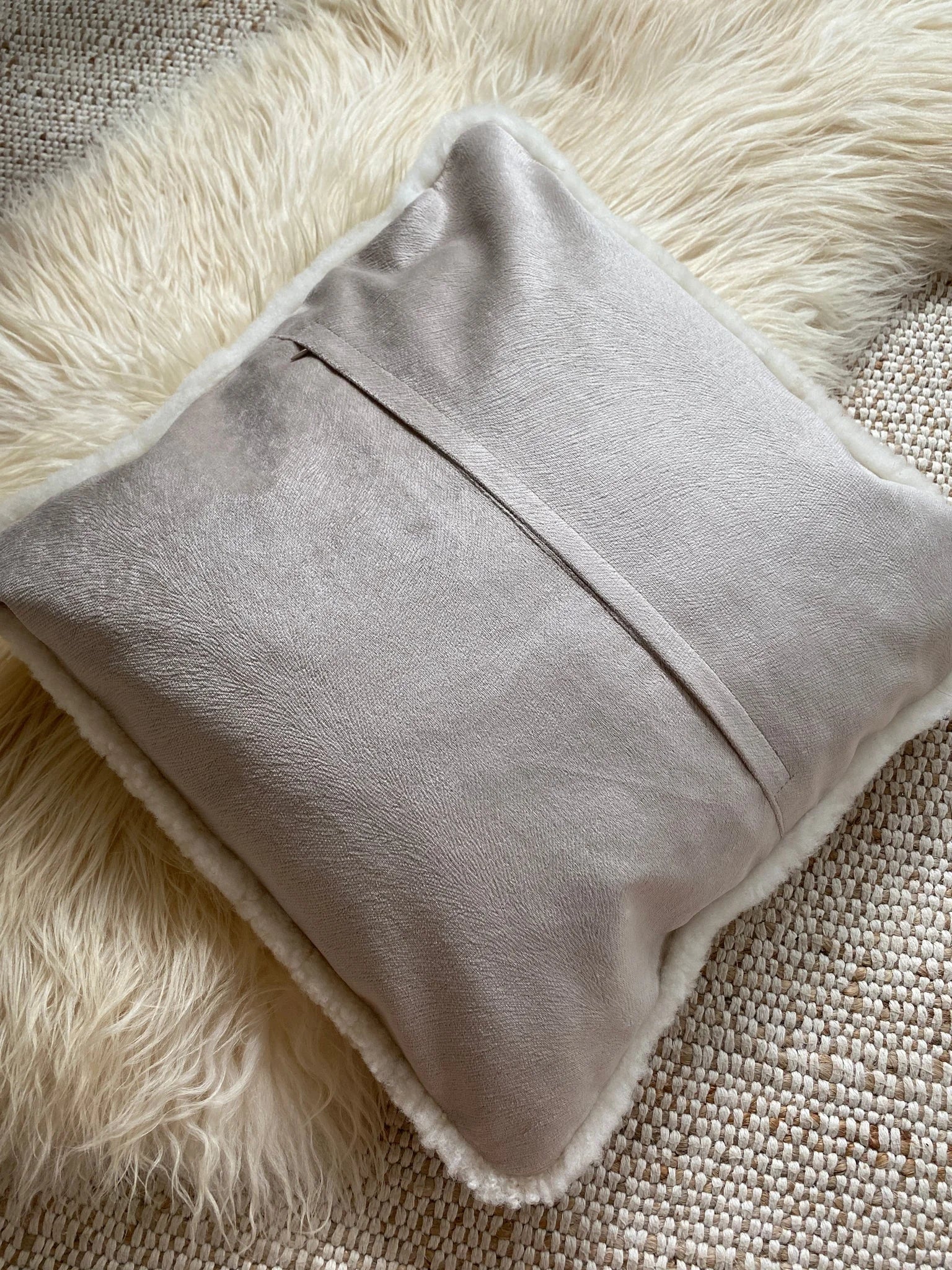 Rear-view of ivory shearling sheepskin pillow