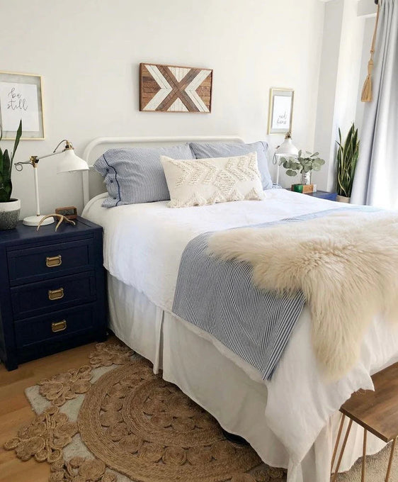 Classic ivory sheepskin on bed