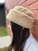 Woman wearing cortina beanie sheepskin bucket hat