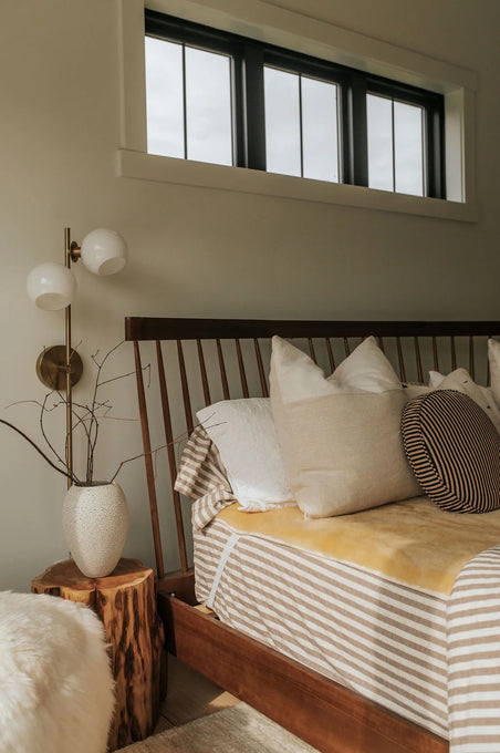 Bed with medical grade sheepskin mattress cover