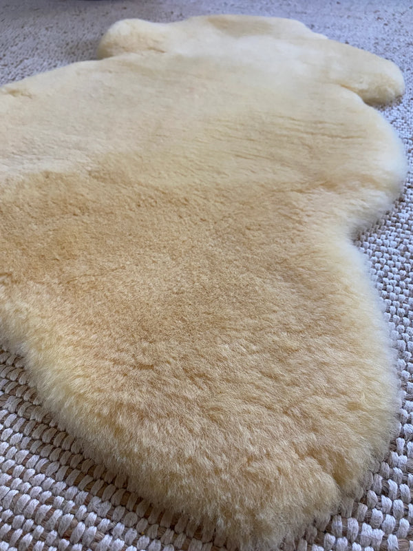 Close-up of medical relugan nursery sheepskin fabric with a soft texture