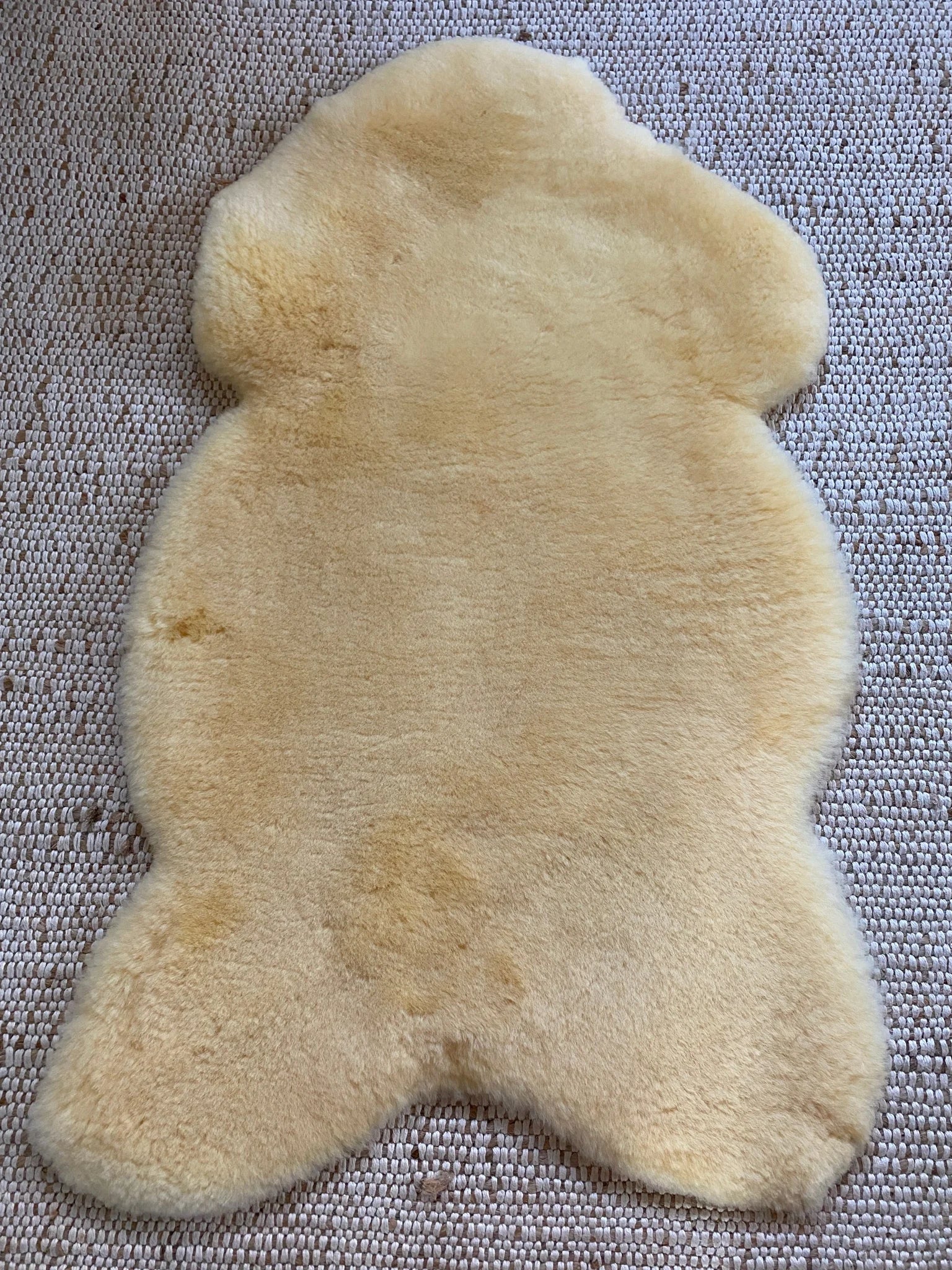 Top view of medical relugan nursery sheepskin fabric with a soft texture