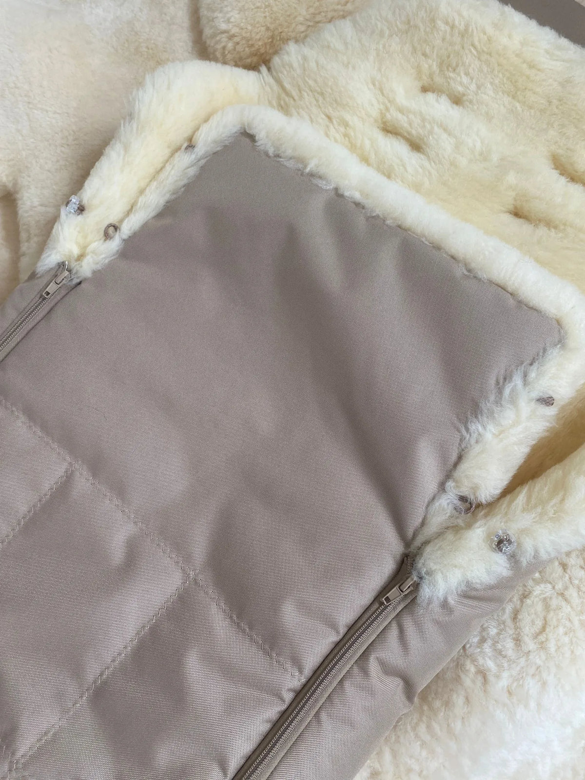 Close-up of a quilted fabric OF medical sheepskin baby toddler sleeping bag