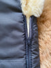 Close-up of a zipper on medical sheepskin baby toddler sleeping bag