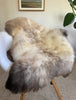 mixed color super soft sheepskin over a chair 