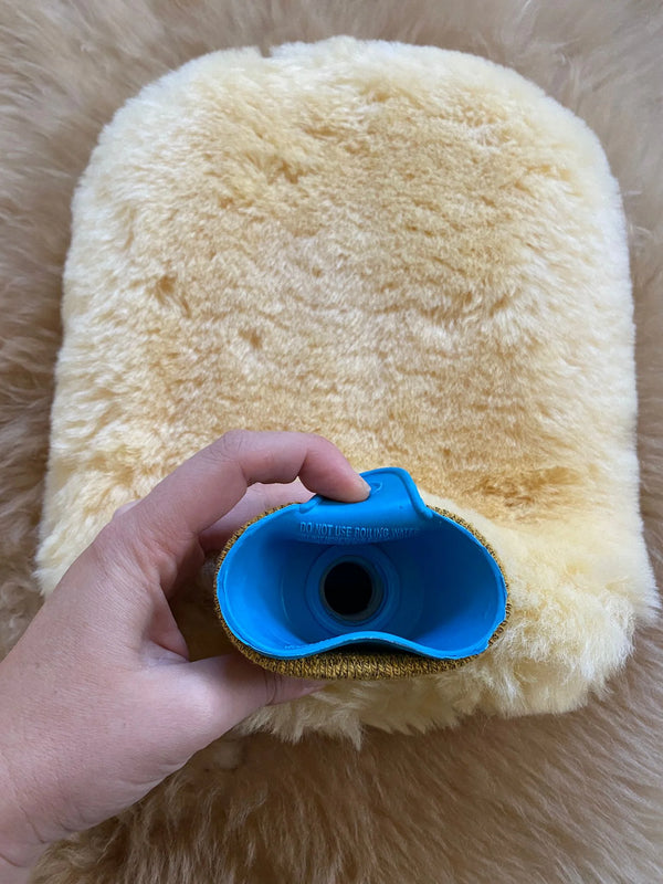 top view of pain and anxiety relief sheepskin hot bottle 
