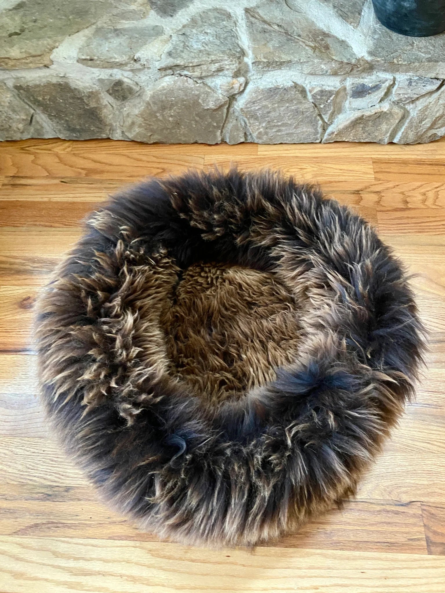 Top-view of plush brown animal snug