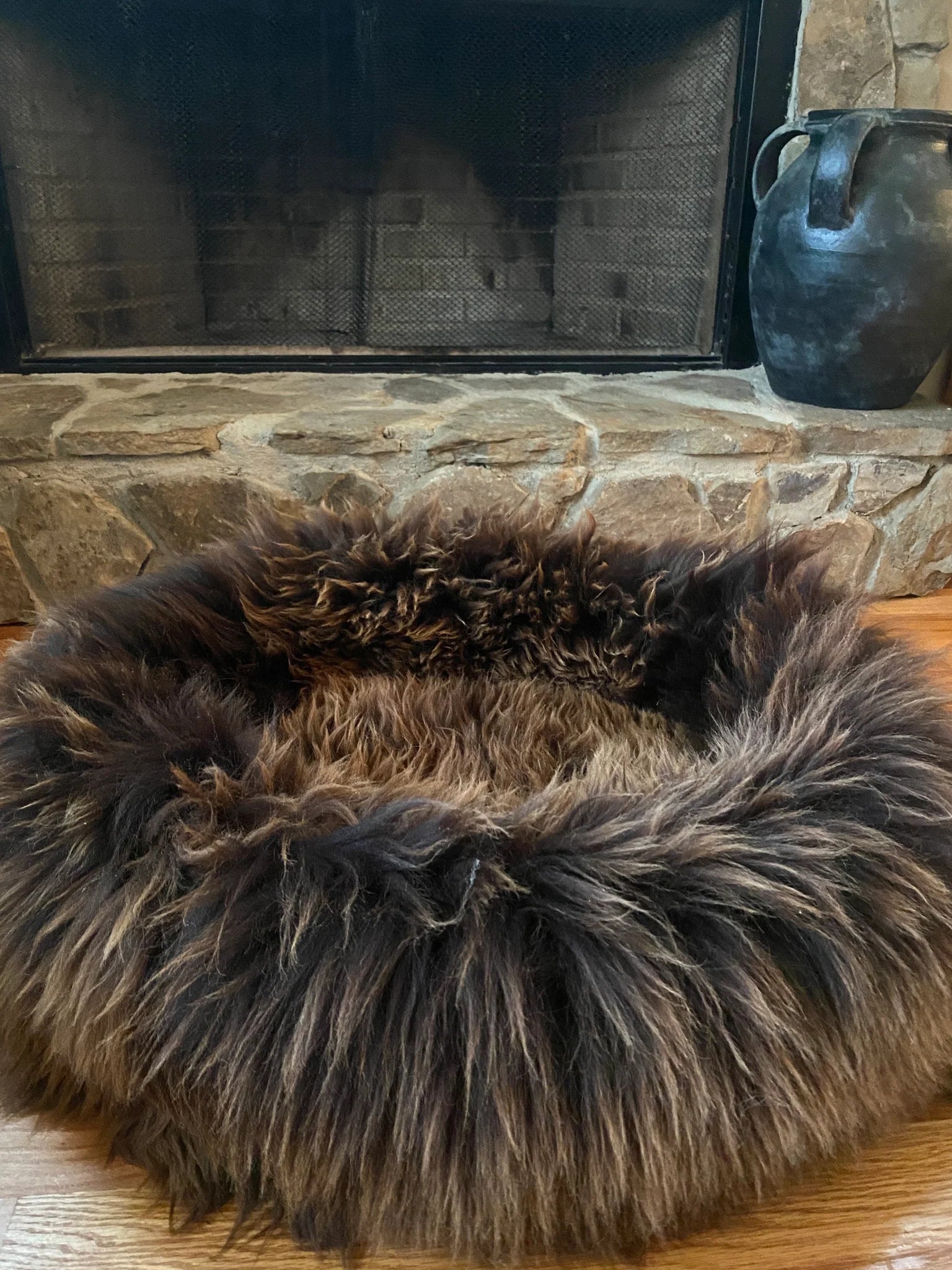 Side-view of plush brown animal snug