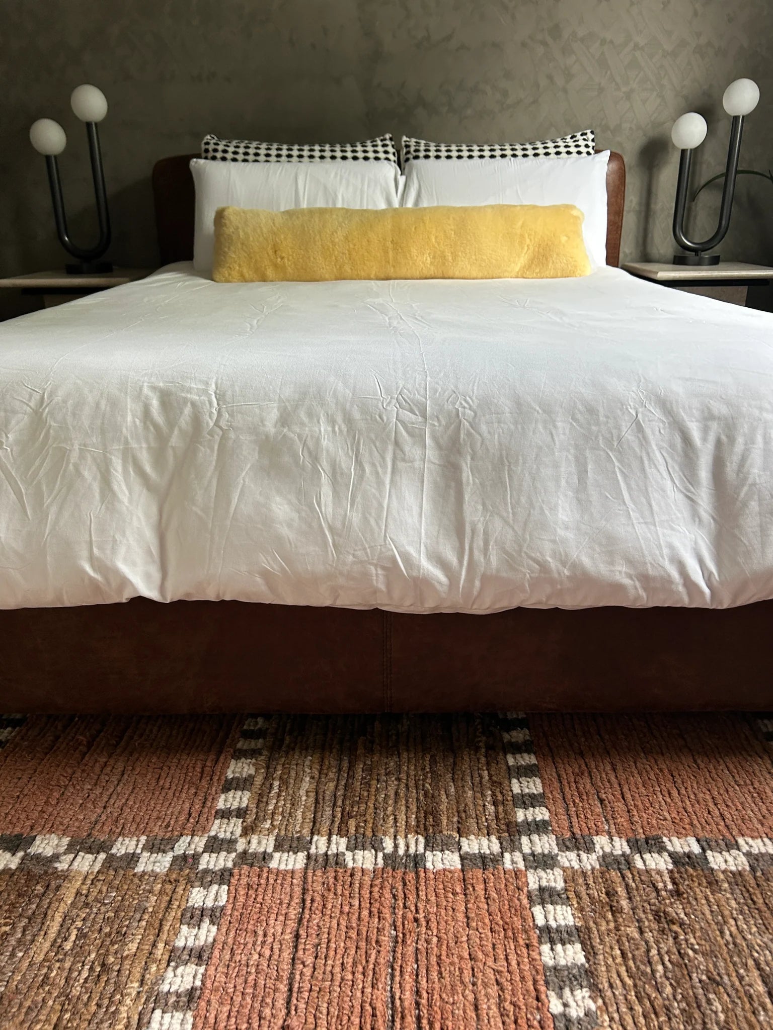 Bed with sheepskin bodypillow case