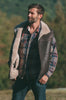 Man wearing a leather sheepskin mens vest outdoors
