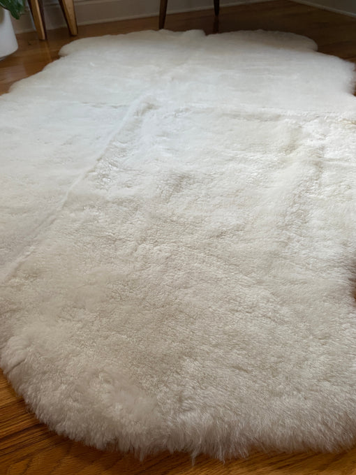 white sheepskin quad