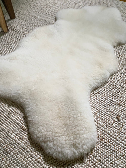 white sheepskin rug